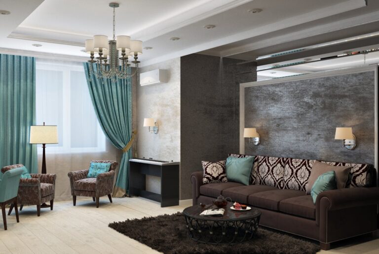 A modern living room with a brown sofa and two armchairs around a coffee table on a dark shaggy rug. A large window with teal curtains, a floor lamp, textured accent walls with sconces, a chandelier, light wood flooring, and a black console table against the wall.